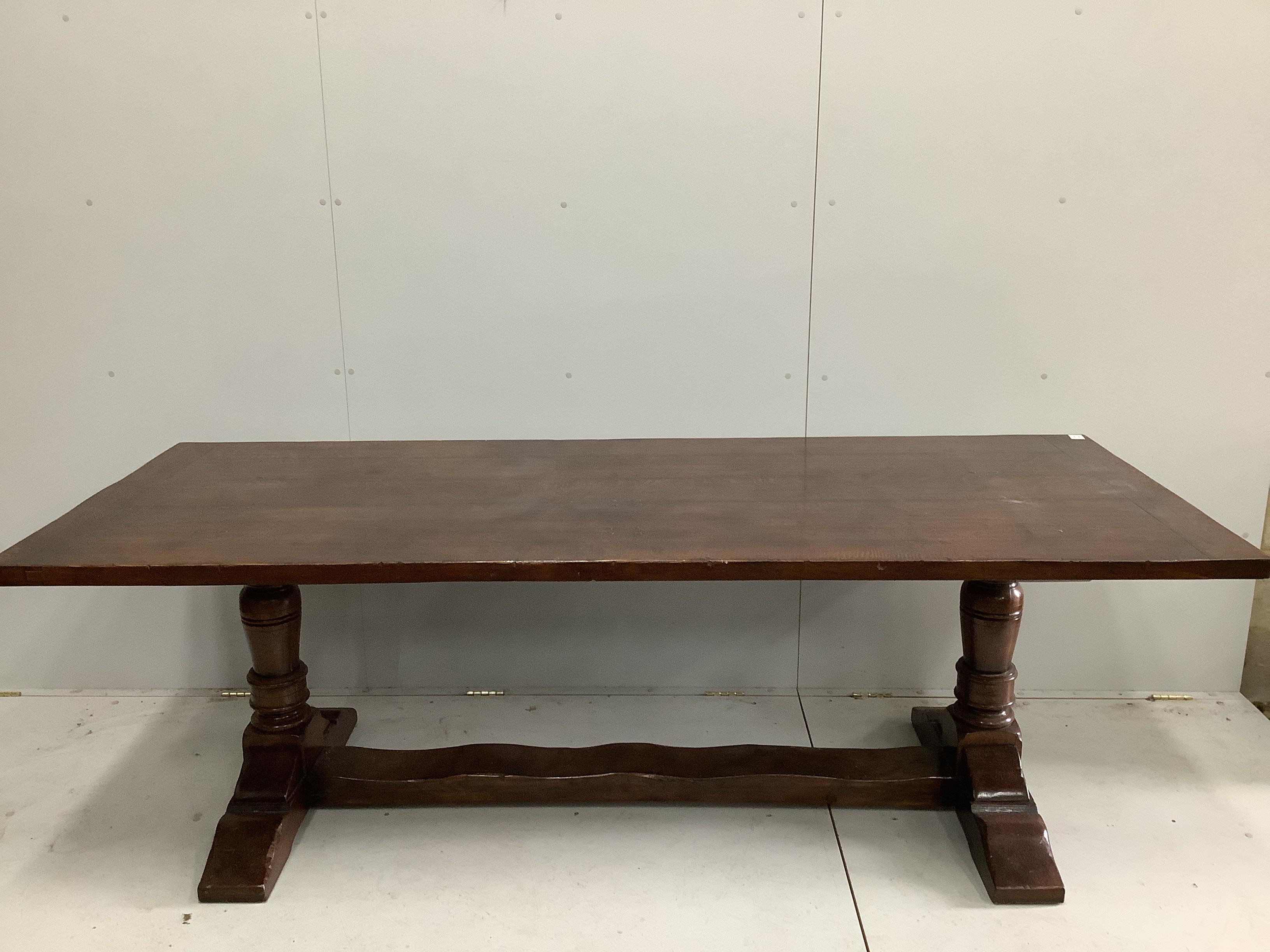 A 17th century style rectangular oak refectory dining table, width 228cm, depth 90cm, height 76cm